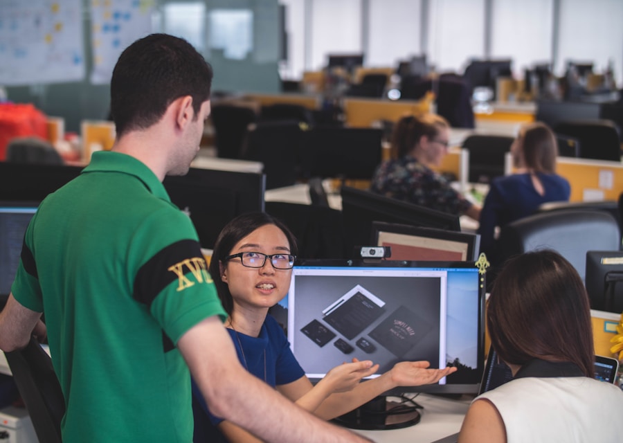 Colleagues reviewing a design in an office
